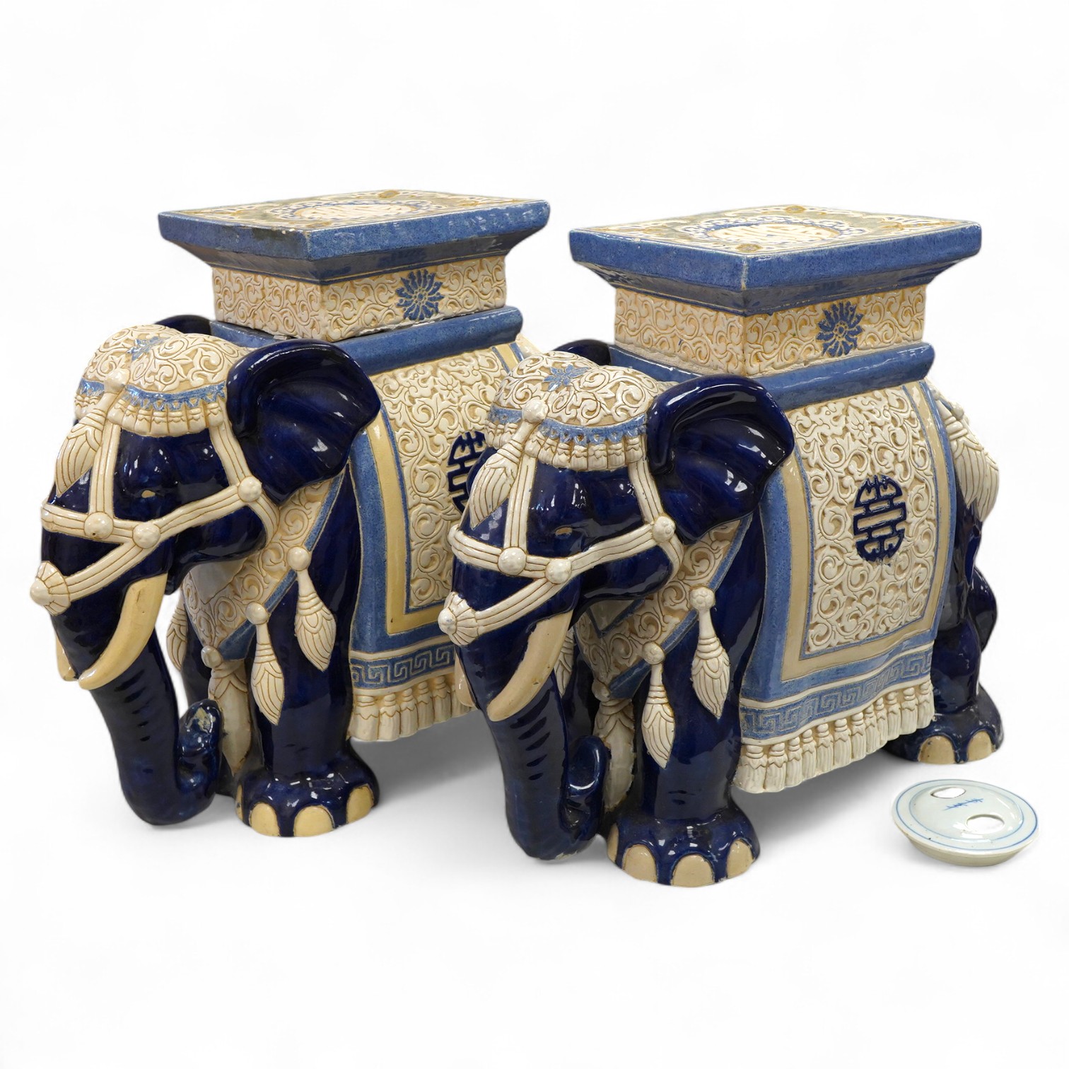 A pair of Chinese glazed earthenware 'elephant' stands, 42.5cm